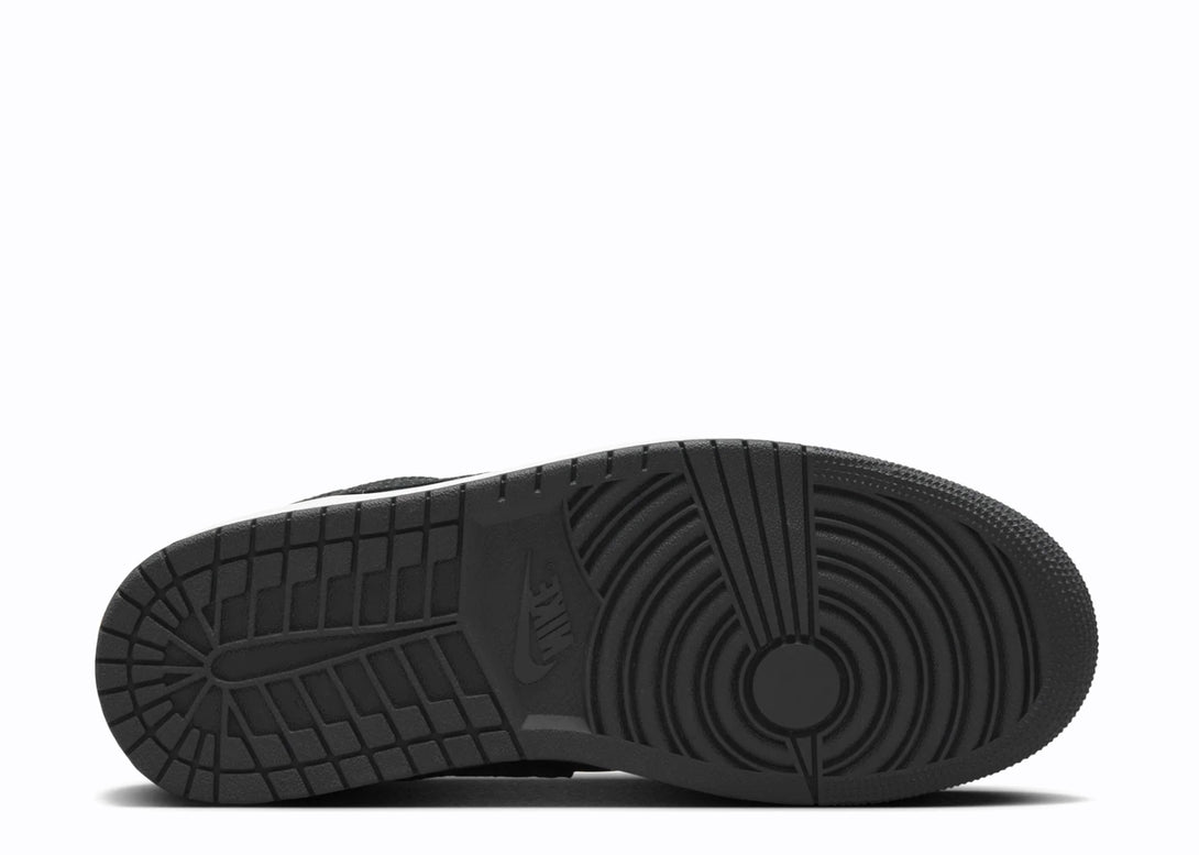 Closeup View of the Sole of Nike Jordan 1 Low Black Elephant Pattern White