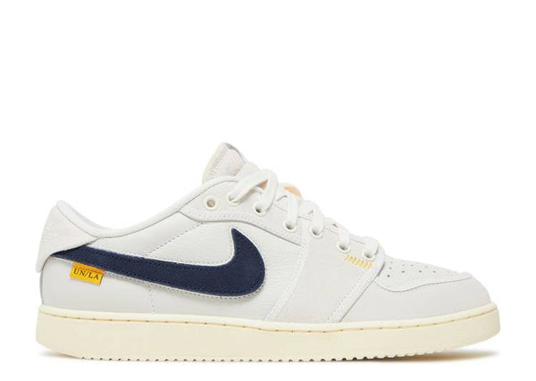 Air Jordan 1 Retro AJKO Low SP Union Sail Leather in white and navy