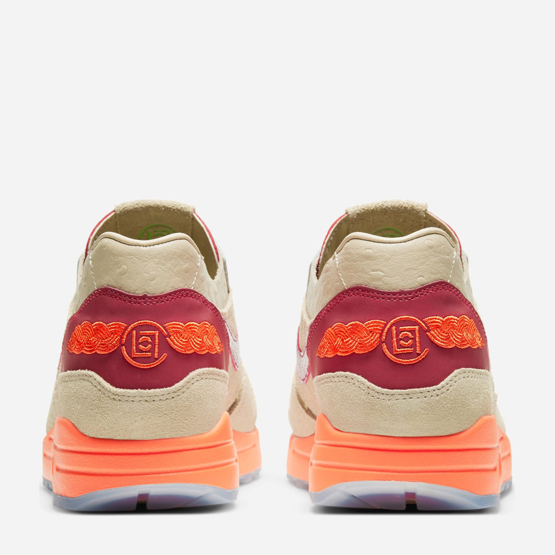 Display of Nike Air Max 1 CLOT Kiss of Death in a beige and orange color scheme