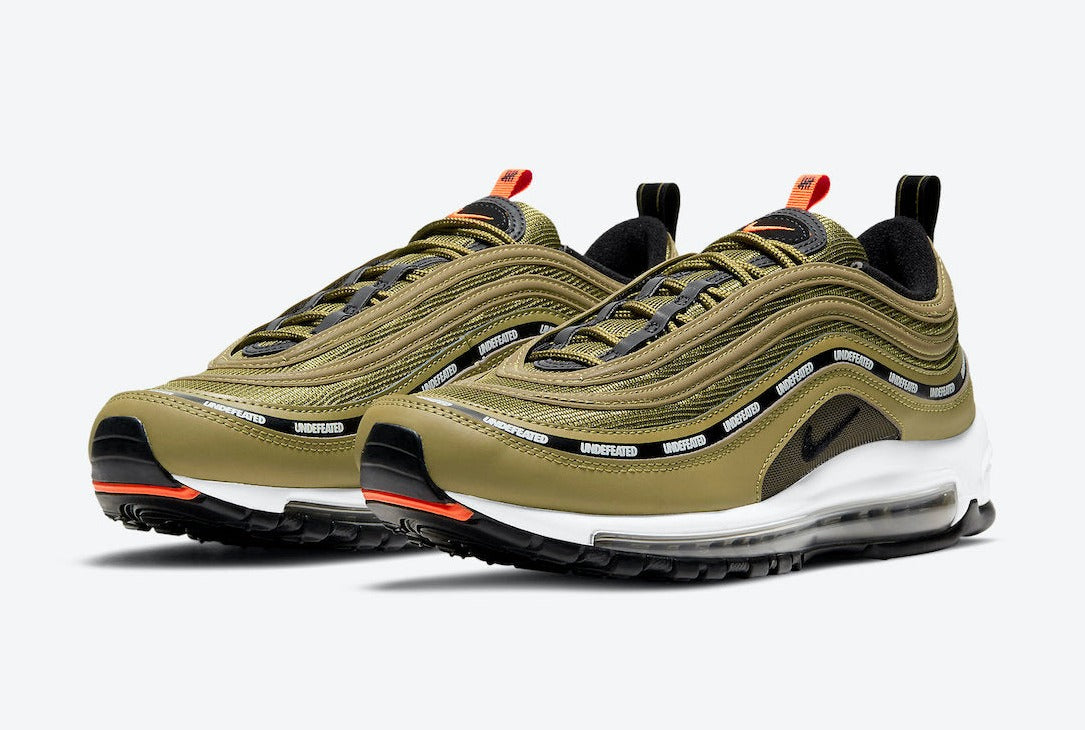 Close-up of the gold detailing on the Nike Air Max 97 Undefeated Black Militia Green