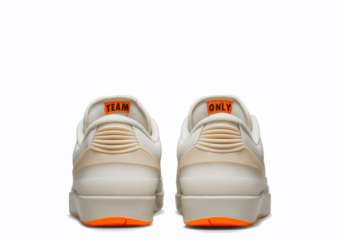 Heel View of Nike Jordan 2 Low Shelflife Cream Orange Team Only Tongue